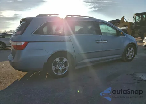 2012 Honda Odyssey Touring z USA, uszkodzony, nr VIN 5FNRL5H95CB088273